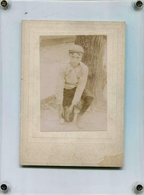Early Boy on Knee with Glove and Ball
